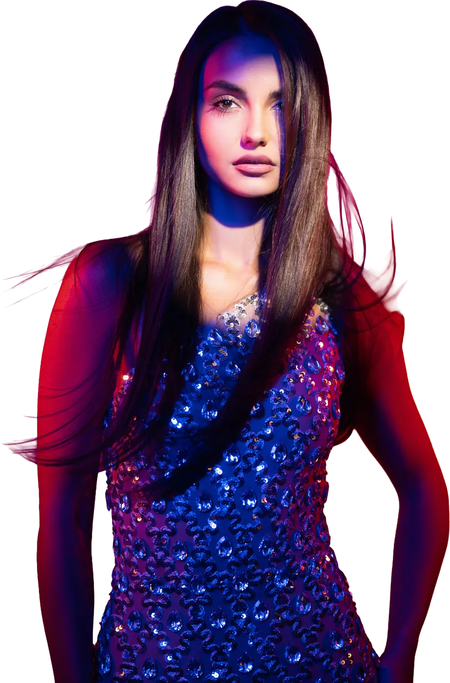 Ogle School student model in a blue sequin dress lit in red and blue